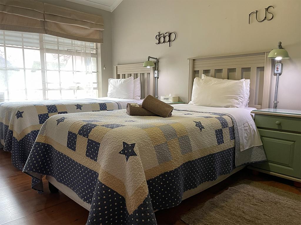Twin room at The Homestead Guesthouse for action cricket and sports groups in Vaalpark